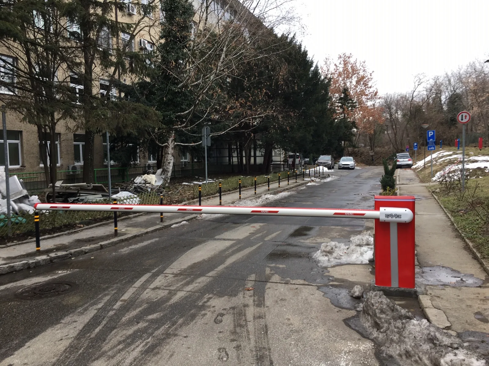 Automatic barrier on an access road