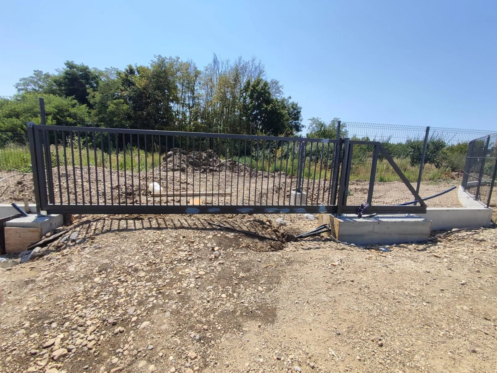 Sliding gate on a building site