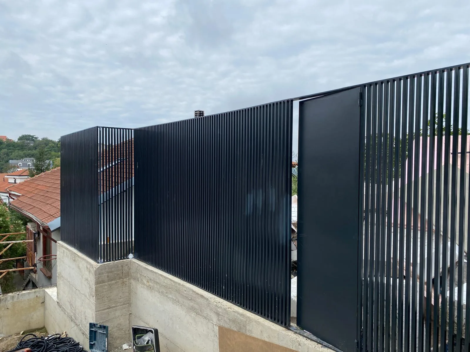 Fence of vertical slats