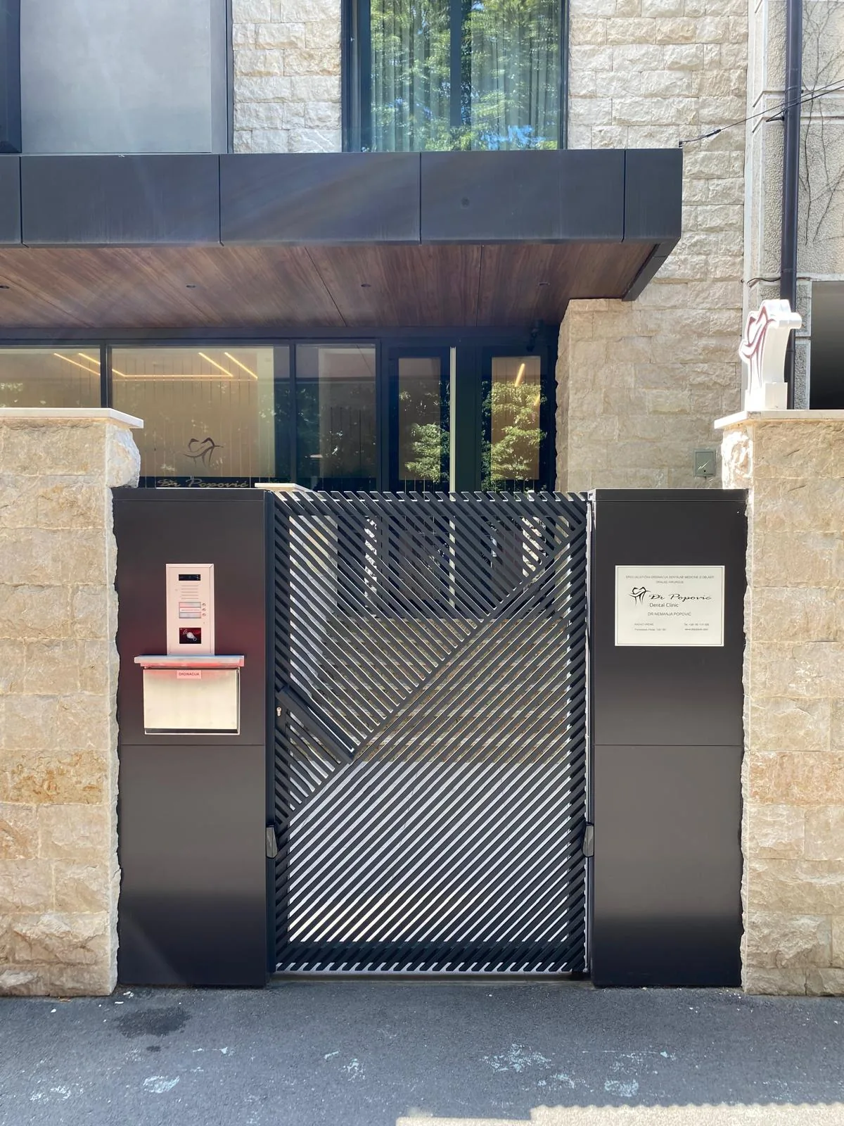 Pedestrian gate with diagonal slats