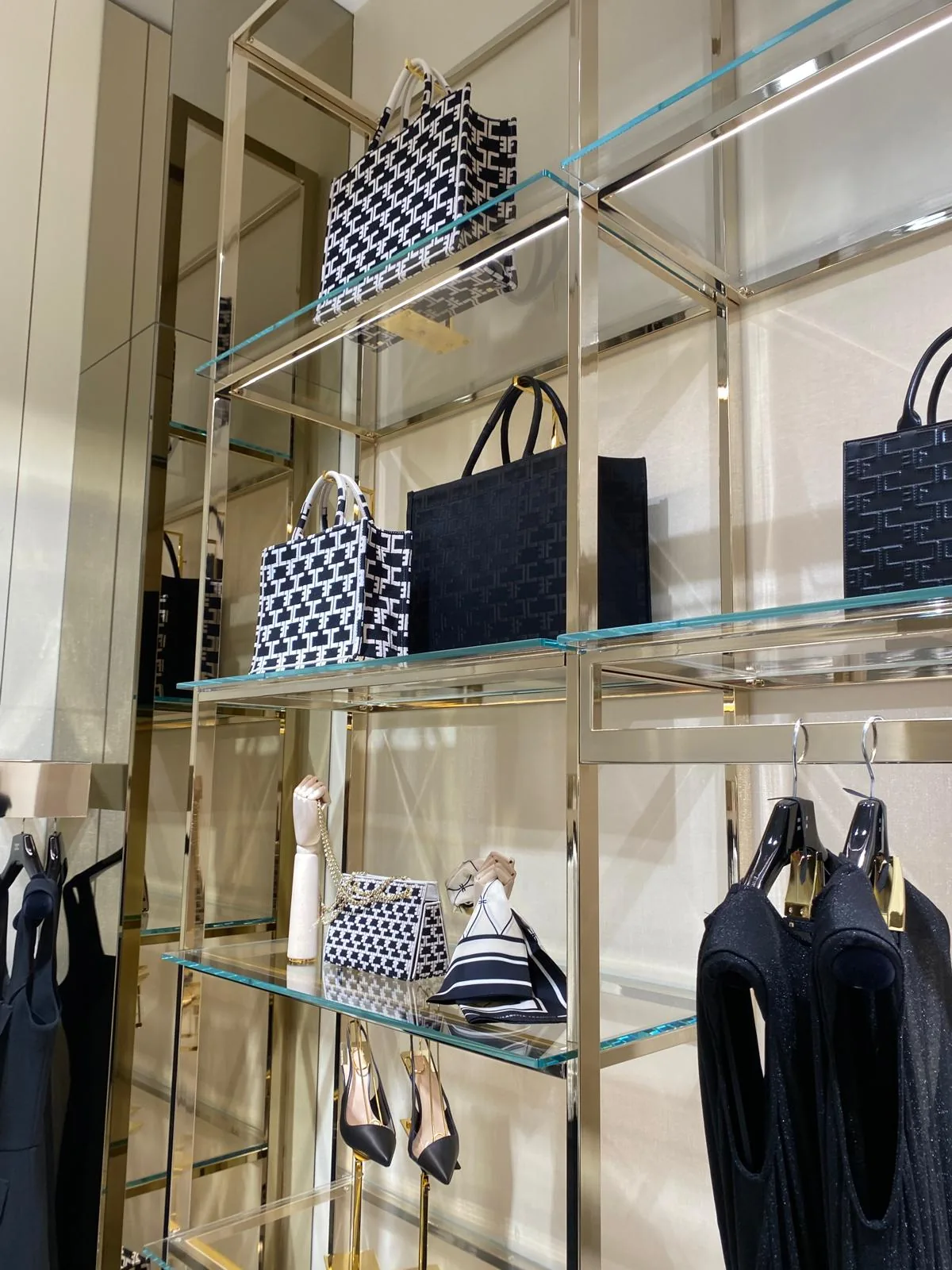Brass and glass shelving