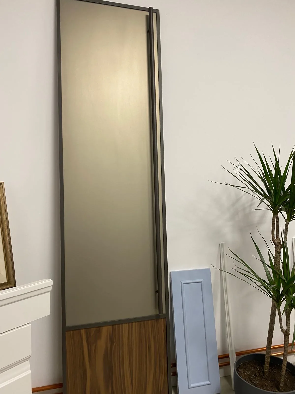 Tall panel in a metal frame