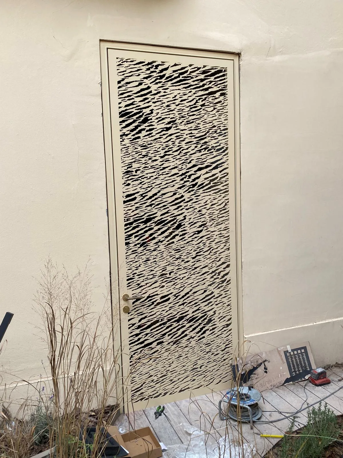 Door with a laser-cut pattern