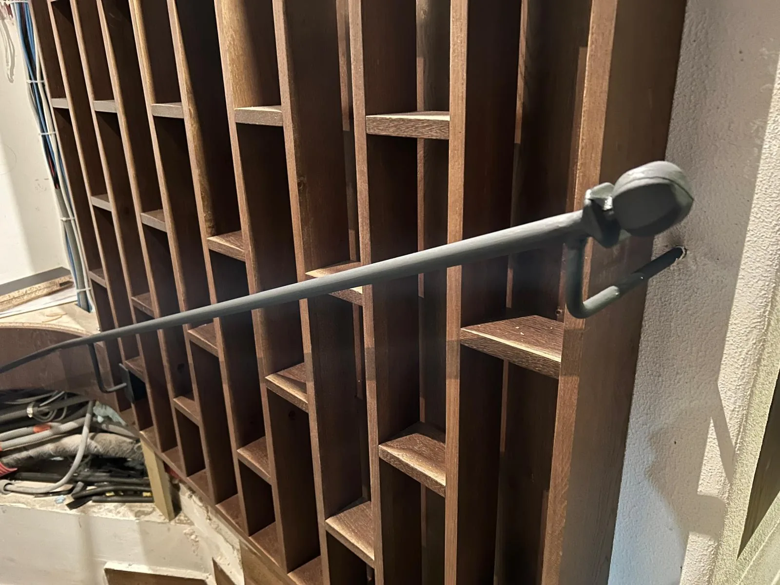 Timber wall lining with a metal rail